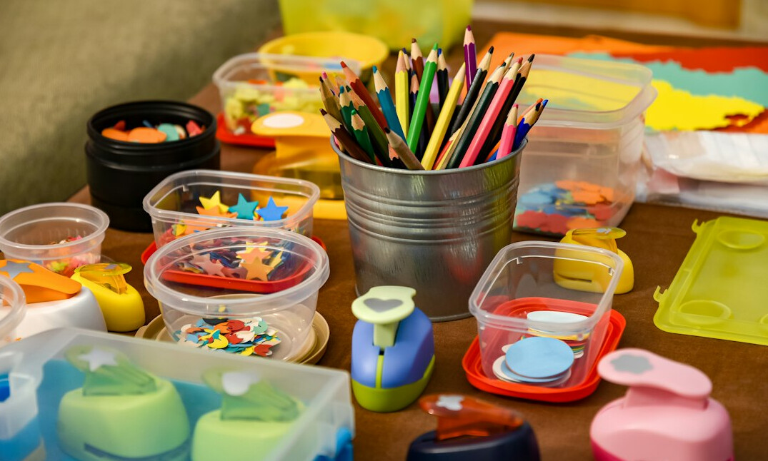 Team building workshop with colorful materials on a table